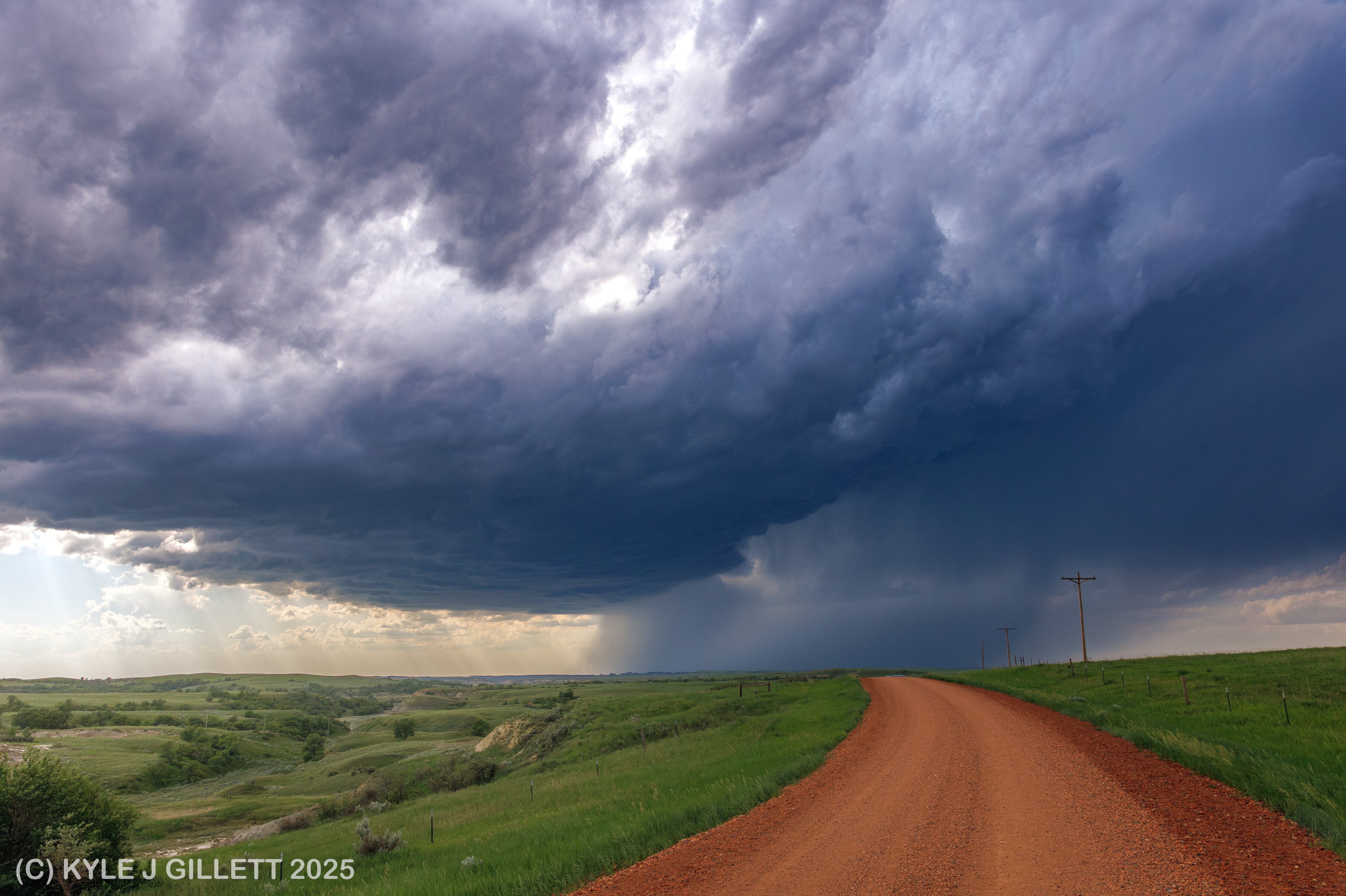 The supercell moving from the Little Missouri Badlands onto the plains.