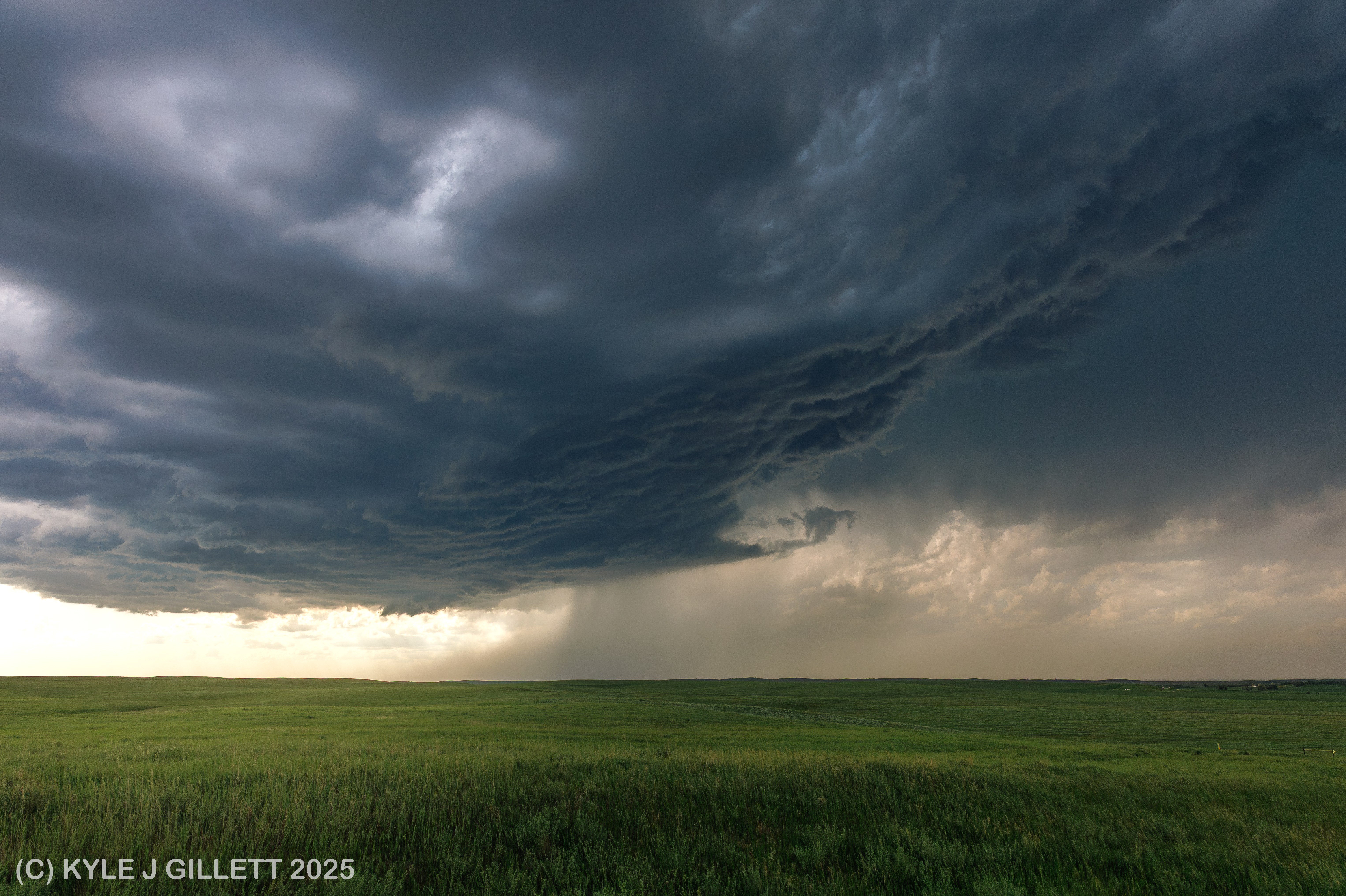 Developing supercell with increasing lightning and an expanding forward flank.